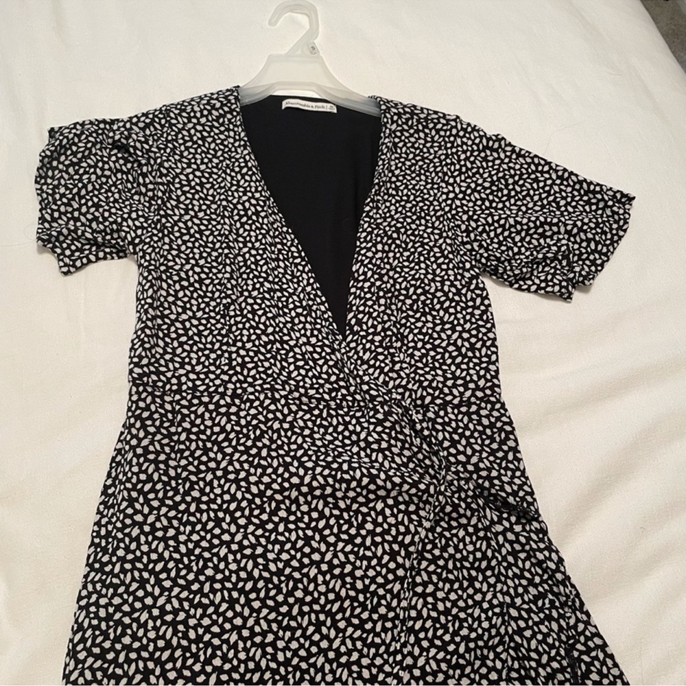 Short black and white wrap dress